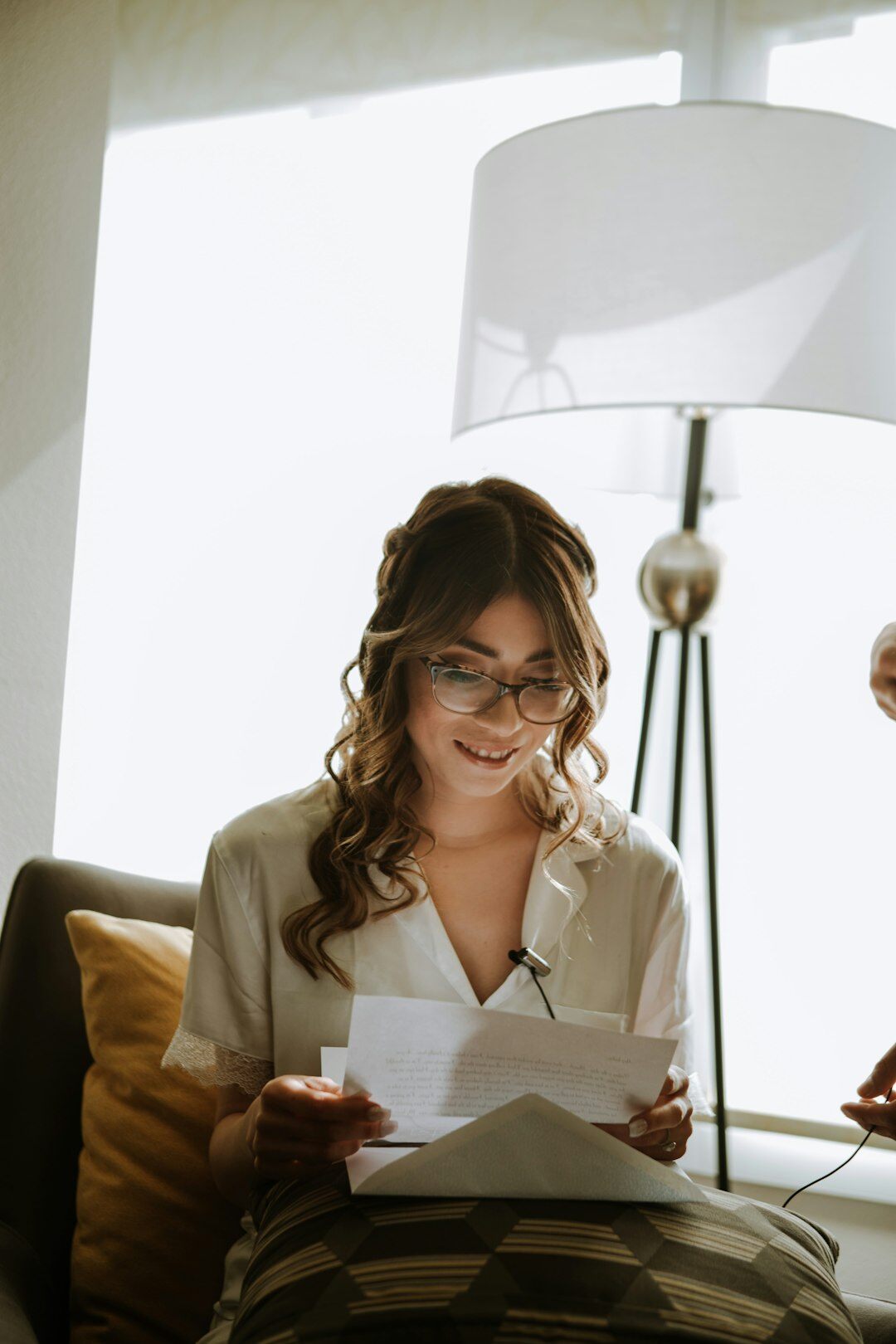 Focused European businesswoman reading a document in an office