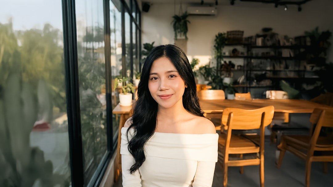 Portrait of a young Asian businesswoman smiling